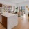 Kitchen with upgraded Moen faucets and fixtures, elevated Thermador appliances with double-oven combo, and imported Italian cabinetry
