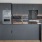 Kitchen with upgraded Moen faucets and fixtures, elevated Thermador appliances with double-oven combo, and imported Italian cabinetry
